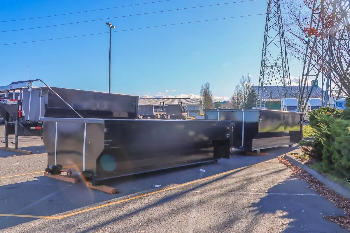 Roll-off dumpster ready for waste disposal at job site for Demolition Dumpster Rental in Volney